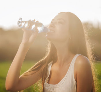 lady drinking alkaline water